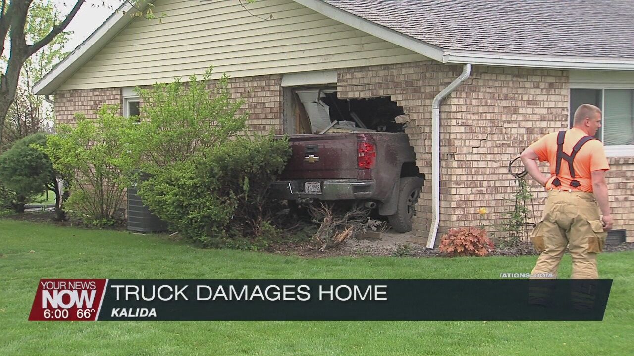 Truck crashes into home in Kalida